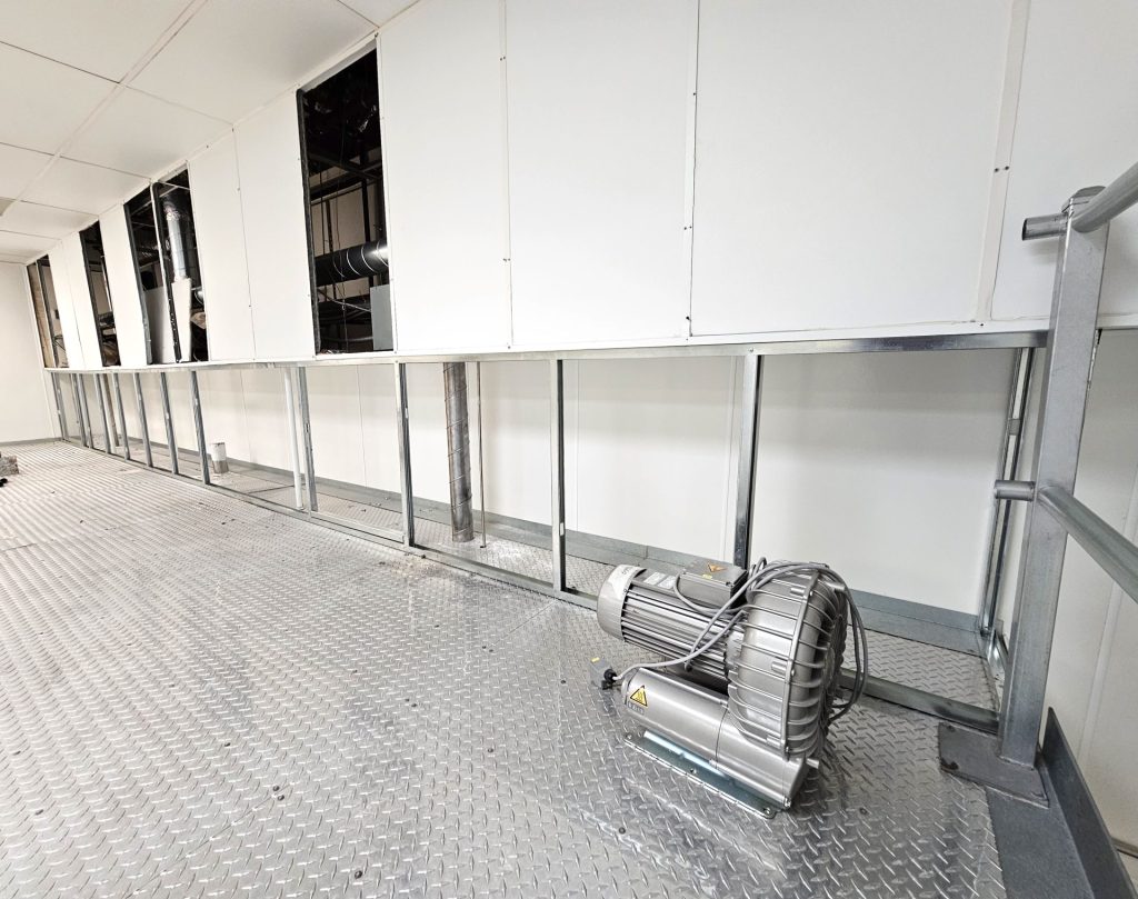 steel studs for new FRP panels with hand railing removed for installation