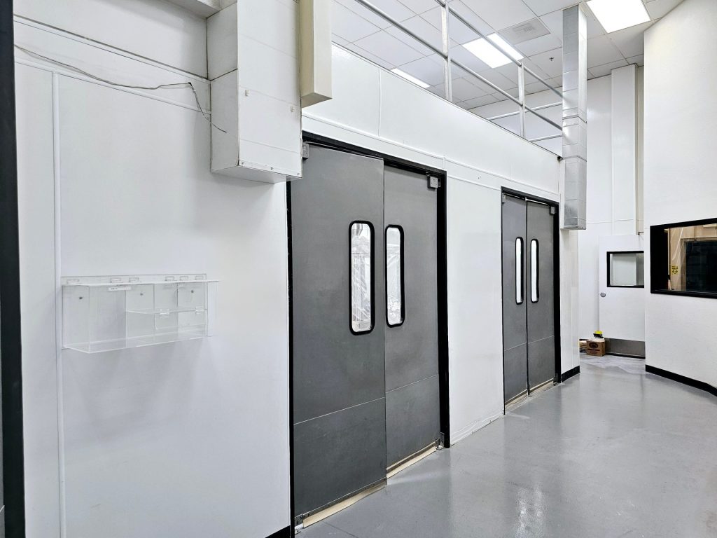 finished double doors underneath mezzanine after FRP has been installed