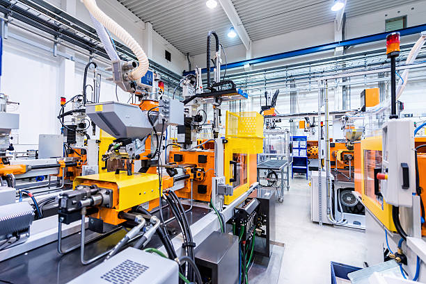 plastic manufacturing machines in factory